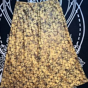 Snakeskin print skirt.